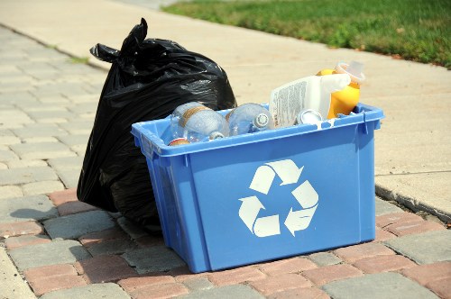 Workers sorting recycling at a depot